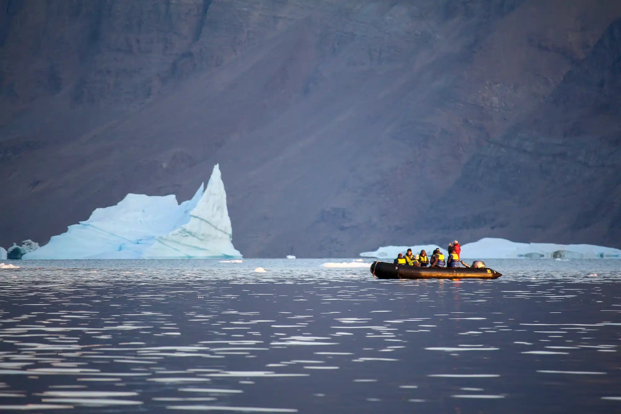 Photo of dinghy navigating an icy coast